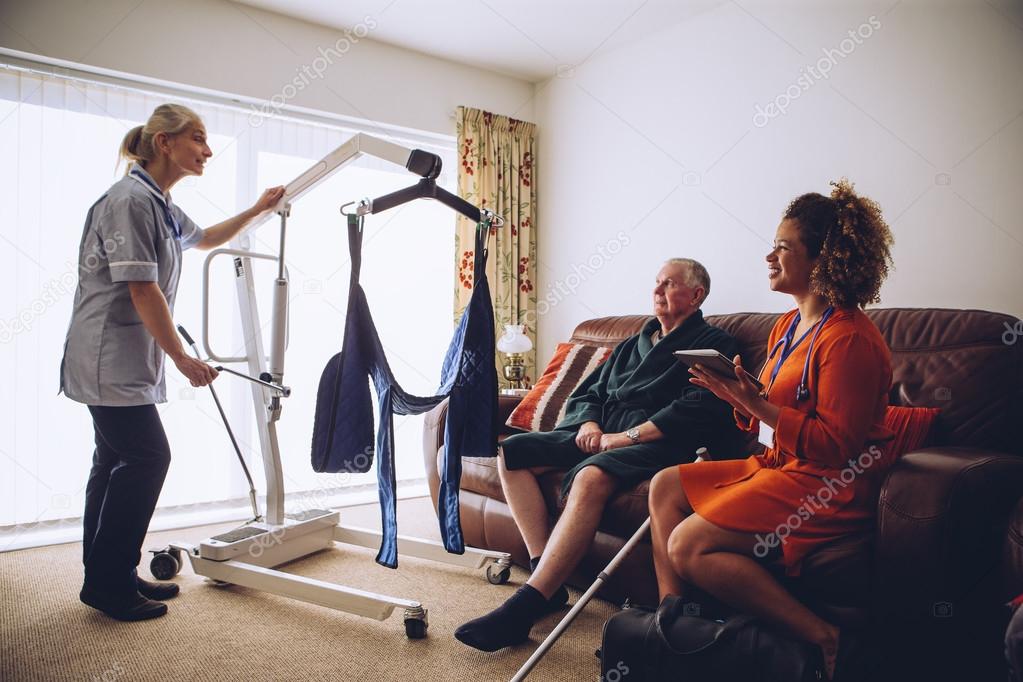 Homecare Workers preparing Hoist