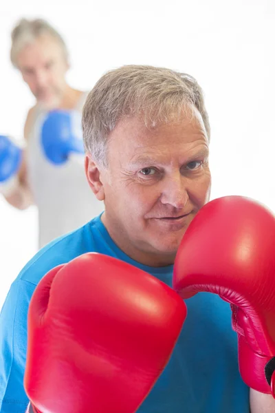 Senior man posing in boxing stance — Stock Photo, Image