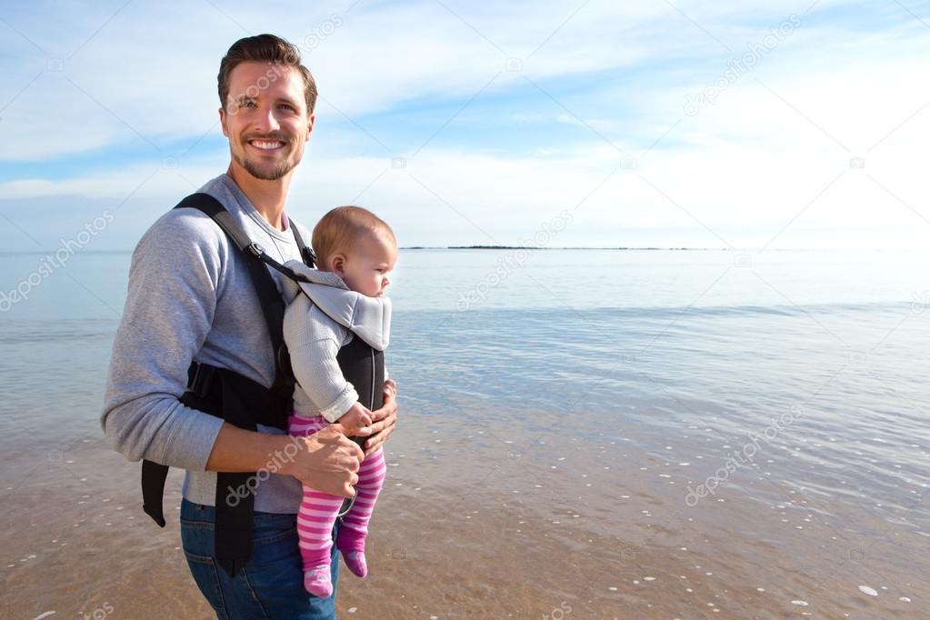 Father and Baby Daughter on Beach