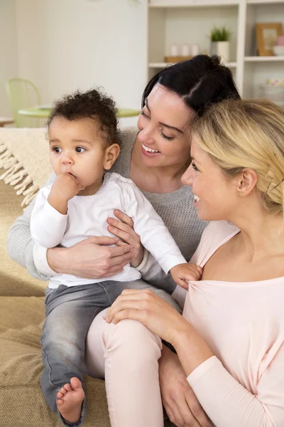 Female couple enjoying quality time with their son at home — Stock Photo, Image