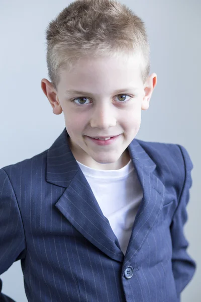 Young boy wearing a suit — Stock Photo, Image