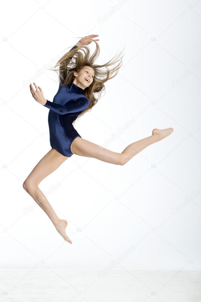 Gymnast posing in midair