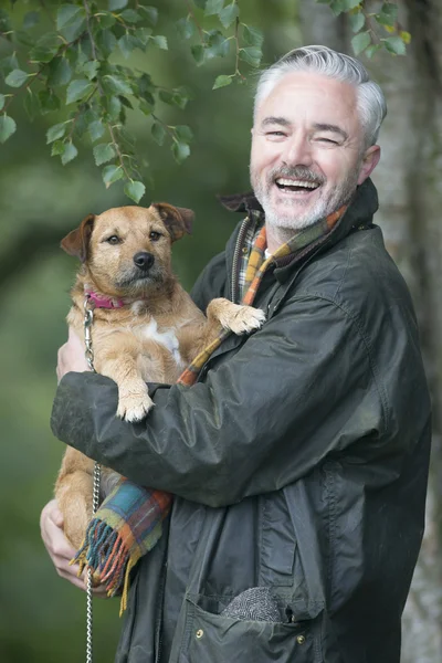 Happy man and his dog — Stock Photo, Image