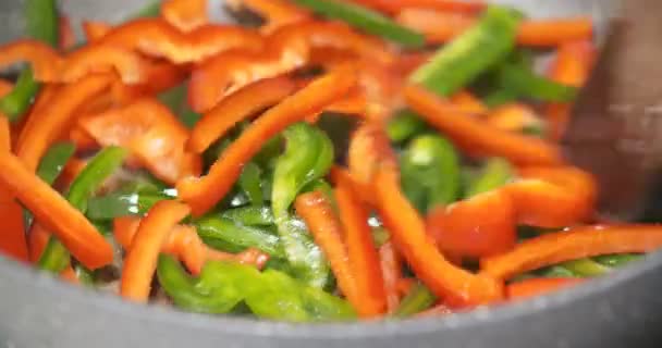 Frying healthly vegetables on pan — Stock Video