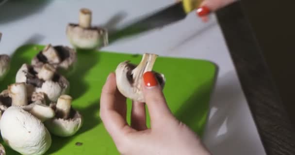 Cleaning wild mushroom with kitchen knife — Stock Video