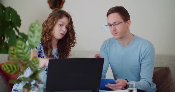 Man and Woman Working Together at Home. — Stock Video