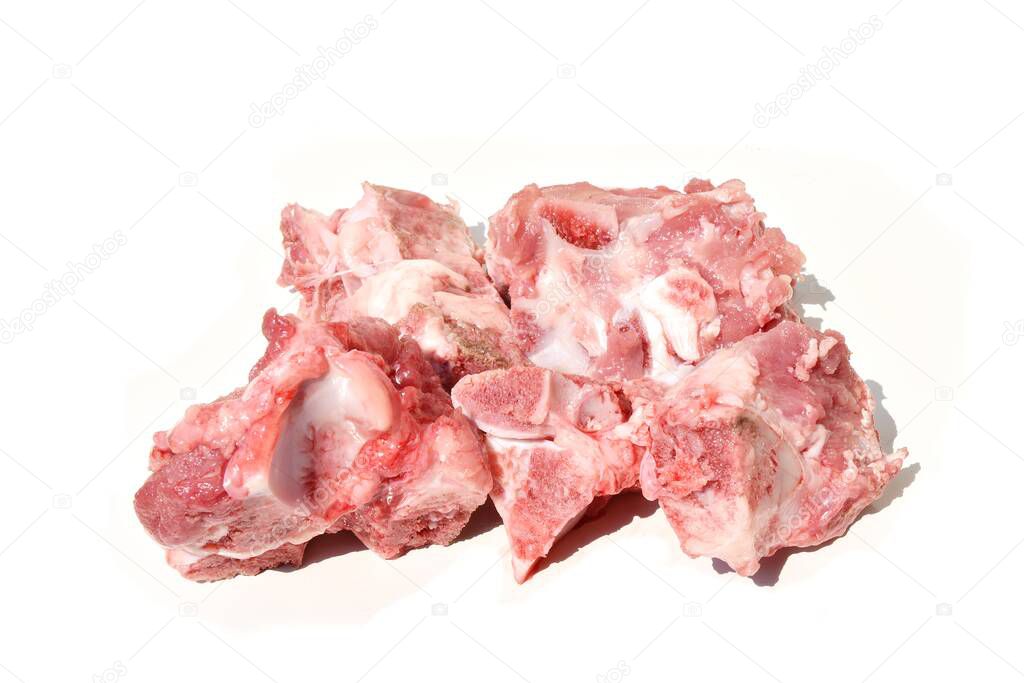 Raw pork spine on a white background, Meat and bones for soup cooking
