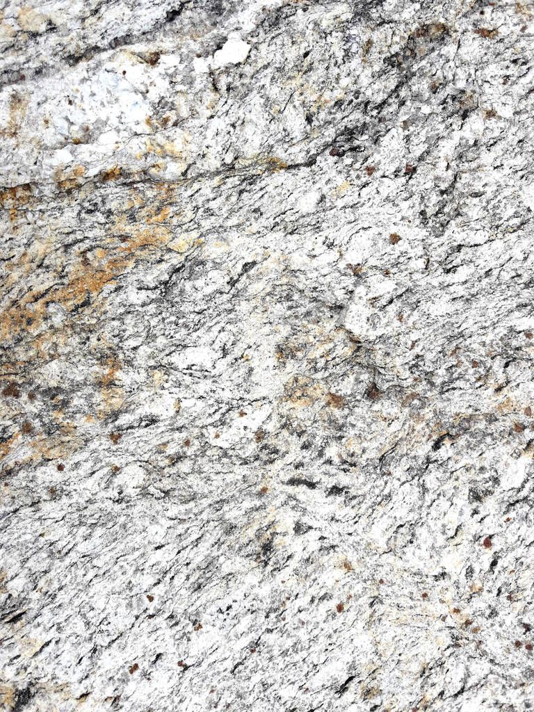 Black with gray and brown stripes on white background, The surface was rough and filled with cracks of stone