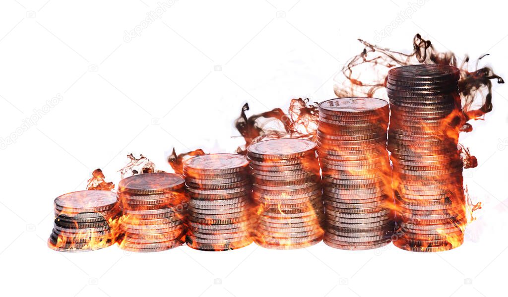 Flame of fire with black smoke from stacks coins row isolated on white background, Placing silver coin in the graph bars, Development and commit business concept, Financial crisis