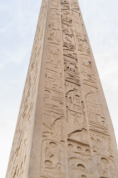 Obelisk with ancient inscriptions — Stock Photo, Image