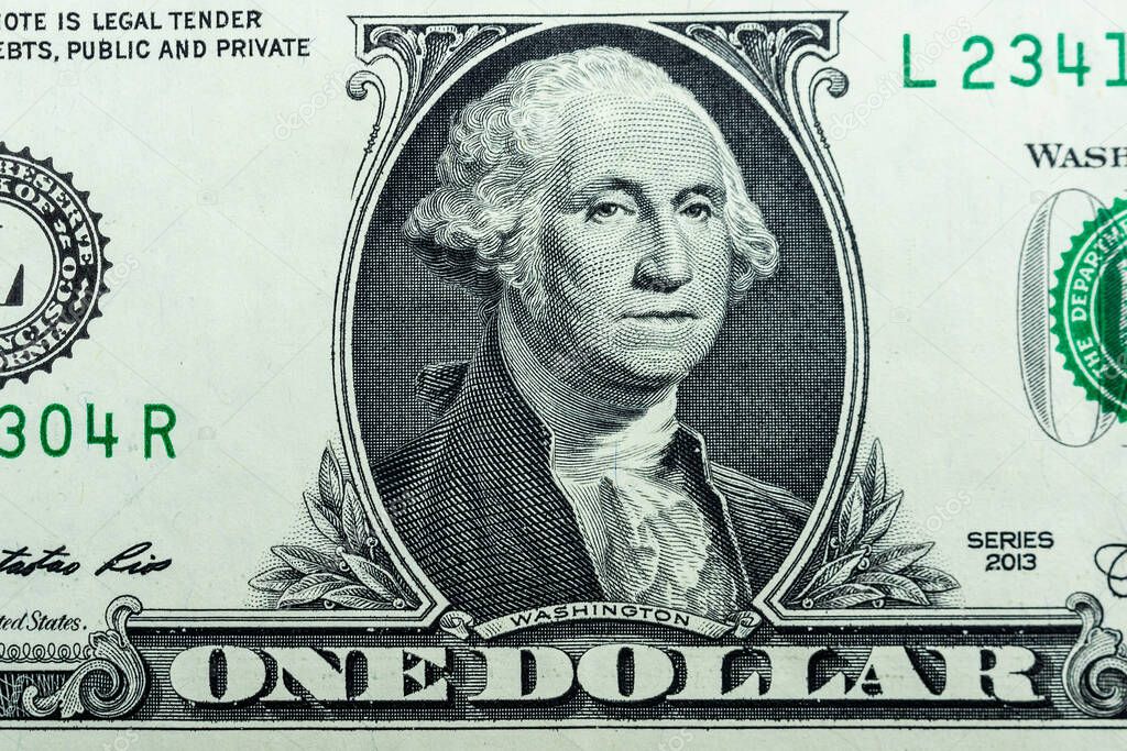 Benjamin Franklin's view of the hundred-dollar bill. Benjamin Franklin portrait macro US dollar bill or banknote