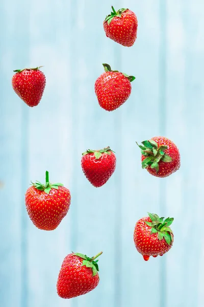 Falling Strawberry Isolated Blue Background Selective Focus — Stock Photo, Image