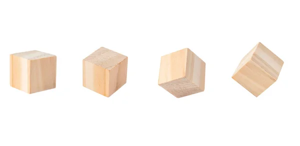Four Wooden Geometric Cube Blocks Flying Different Sides Isolated White — Stock Photo, Image