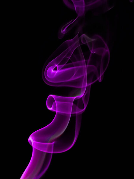 Swirling movement of purple smoke group, abstract line Isolated on black background