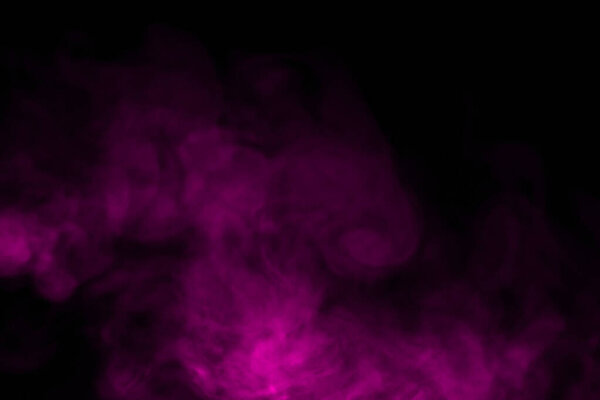 Close-up of purple smoke with spray from a humidifier. Isolated on black background