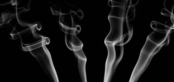 白煙群の旋回運動を設定 抽象的な線黒の背景に隔離 — ストック写真