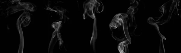 白煙群のコレクション渦巻く動き 抽象的な線黒の背景に孤立 — ストック写真