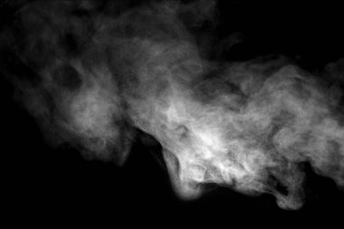 White smoke or steam isolated on black background, abstract texture symbolizing mystery, fire, cooking, vapor, fog, and dramatic effect, perfect for design, advertising, and creative backgrounds.