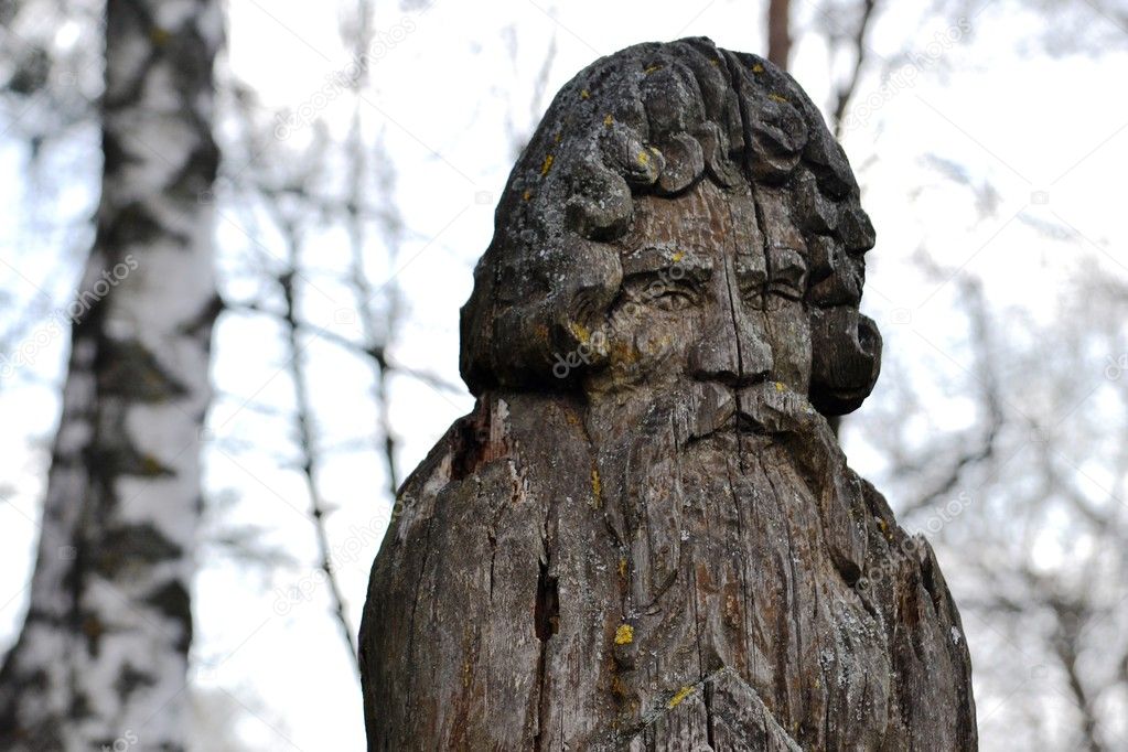 sculptures made of wood: the head of a pagan idol