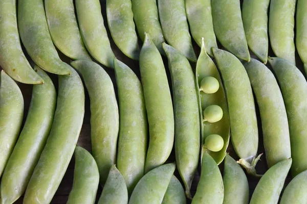 Fundo Vegetal Vagens Ervilha Verde Uma Fileira Estão Perto Outro — Fotografia de Stock