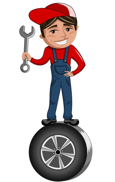 Cartoon mechanic holding spanner and standing on car tire — Stock vektor