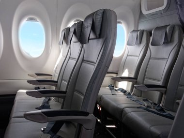 Boş uçaktaki birinci sınıf koltuklar.