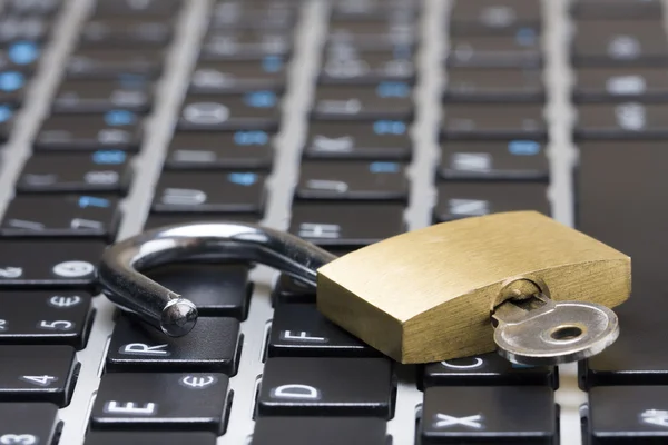 Computer security concept with an open padlock — Stock Photo, Image