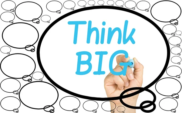 Hand writing Think Big in big bubble competing with smaller ones on a clear glass whiteboard isolated — Stock Photo, Image