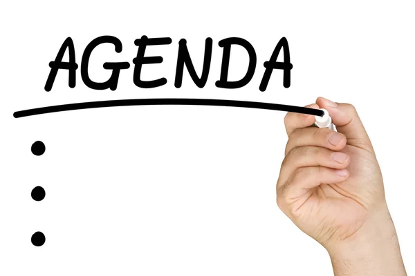 Hand underlining agenda text with black felt tip or marker on a clear glass whiteboard isolated — Stock Photo, Image