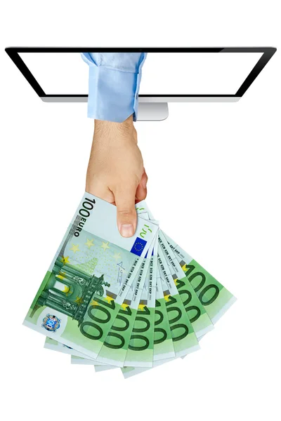 Hand hält Fan von 100-Euro-Banknoten, die aus dem Computerbildschirm kommen — Stockfoto