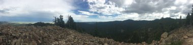 Panorama taken off of Tooth Ridge of a mountain range. Taken at Philmont Scout Ranch in 2019.