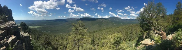 Panorama taken off of Tooth Ridge of a mountain range. Taken at Philmont Scout Ranch in 2019.