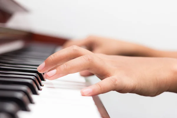 Little girl playing piano