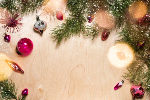 Old vintage Christmas tree ornaments and pine tree — Stock Photo, Image