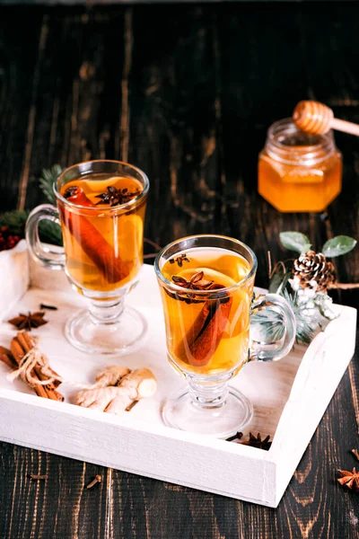 Glass cup of hot ginger tea with lemon and honey — Stock Photo, Image