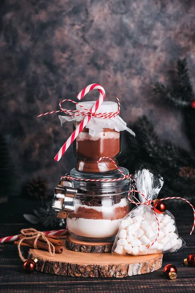 Christmas gift cookie mix and chocolate drink in glass jar — Stock Photo, Image