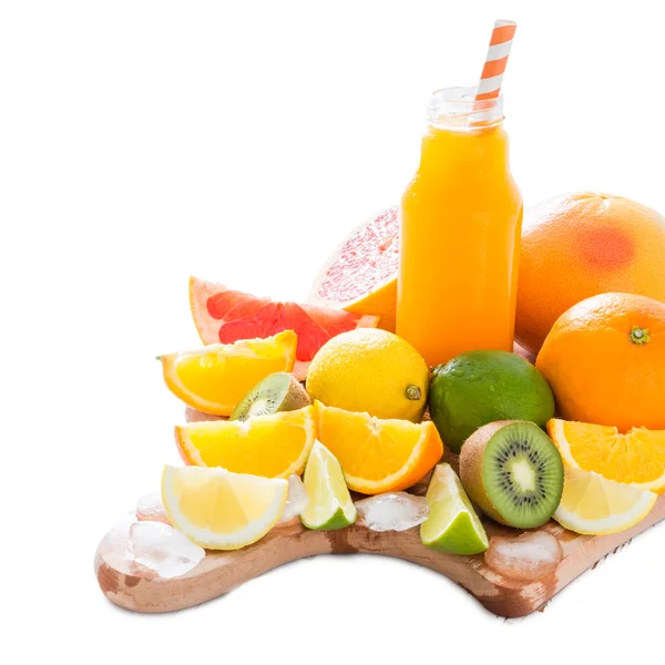 Juice with selection of tropical fruits, isolated on white — Stock Photo, Image