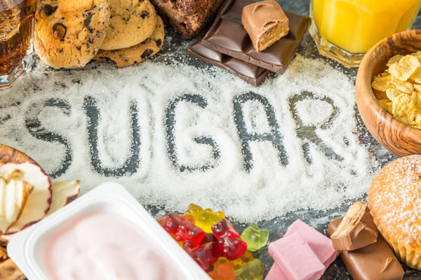 Selection of food high in sugar — Stock Photo, Image