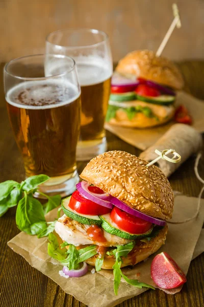 Chicken grill burger on wood background — Stock Photo, Image