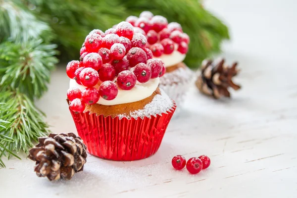 Noel cupcakeon rustik arka plan — Stok fotoğraf