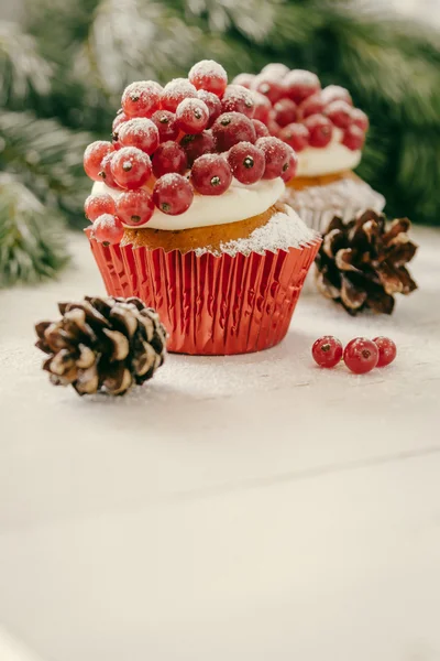 Noel cupcakeon rustik arka plan — Stok fotoğraf