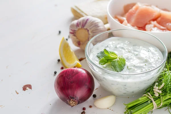 Tzatziki sauce and meat for kebabs — Stock Photo, Image
