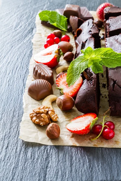 Brownie with nuts and mint — Stock Photo, Image
