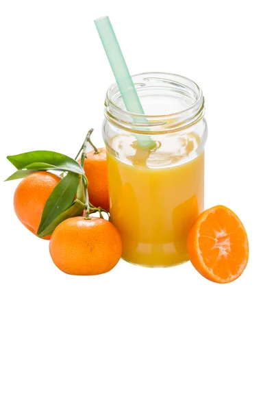 Mandarin juice in glass jar — Stock Photo, Image