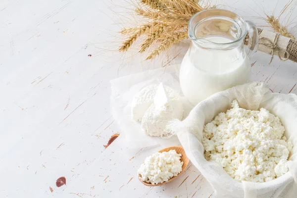 Selection of dairy products and wheat — Stock Photo, Image