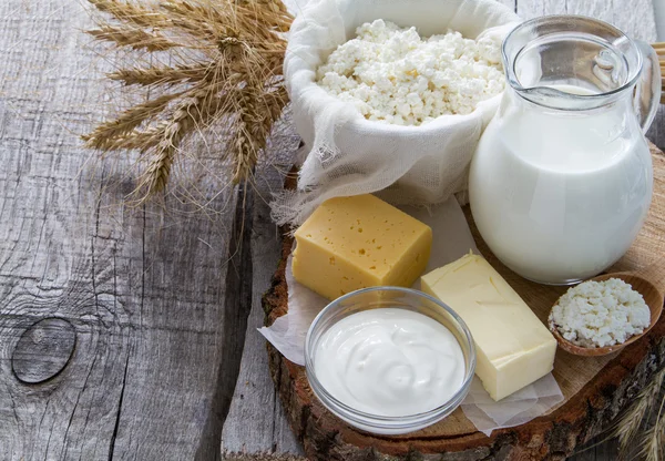 Selection of dairy products and wheat — Stock Photo, Image