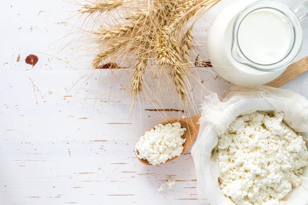 Selection of dairy products and wheat — Stock Photo, Image