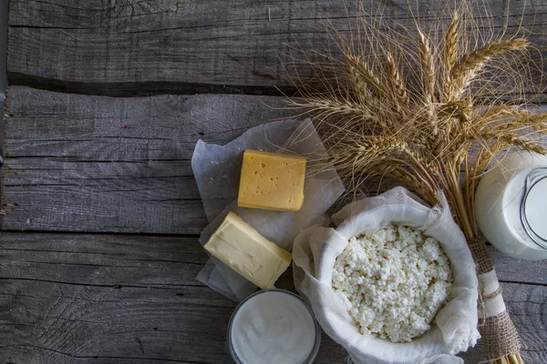 Selection of dairy products and wheat — Stock Photo, Image