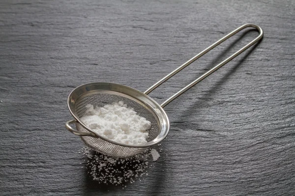 Powder in sieve close up — Stock Photo, Image