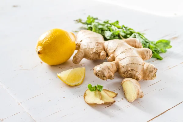 Ginger lemon mint on white wood background — Stock Photo, Image